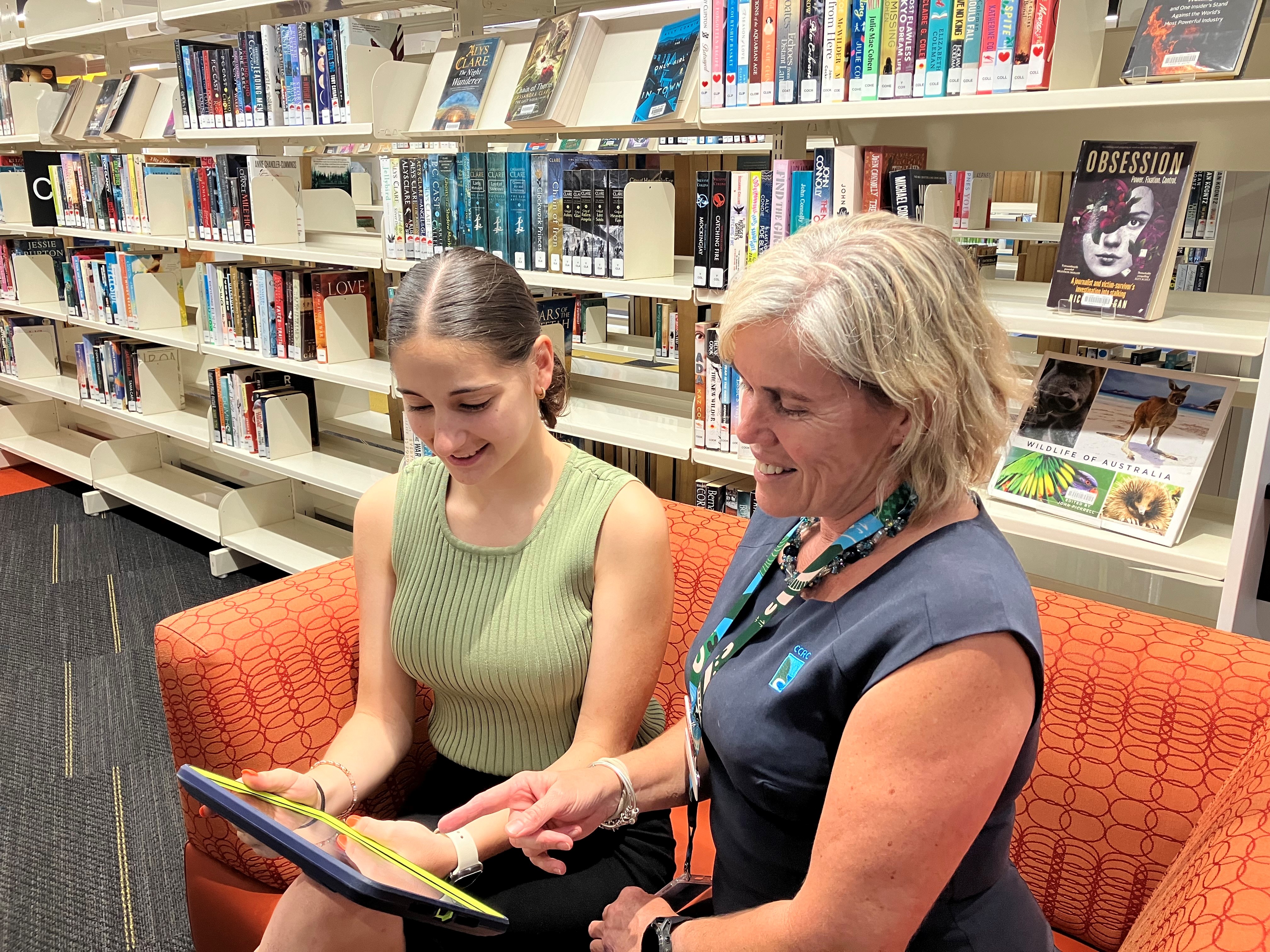 Logan lizzio with librarian carolyn johnson innisfail library 05 02 2024