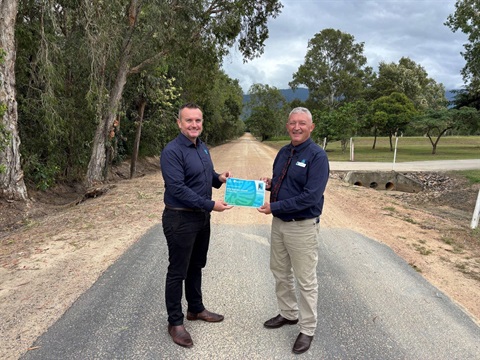 CEO Andrew Graffen and Councillor Jeff Baines with the Reef Guardian Council Action Plan